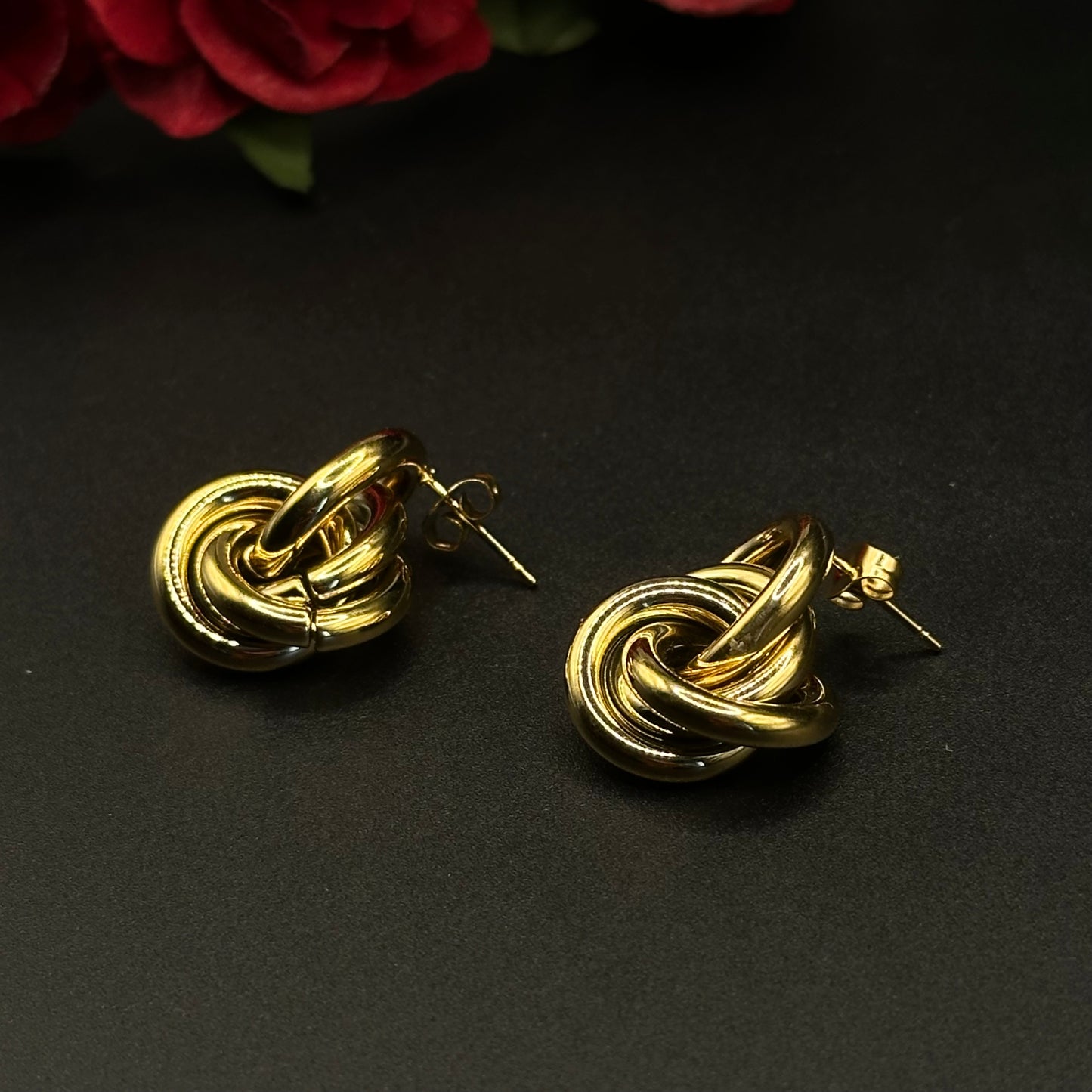 Boucles d’oreilles nœud doré