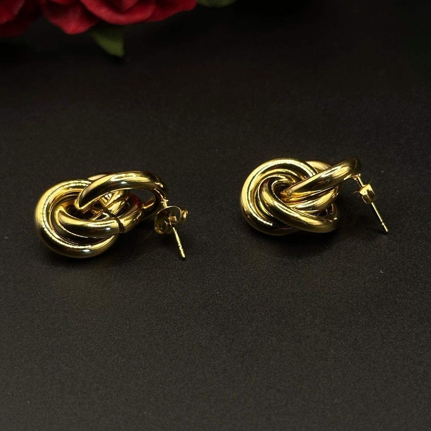 Boucles d’oreilles nœud doré