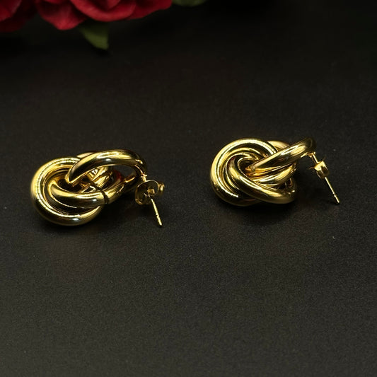 Boucles d’oreilles nœud doré