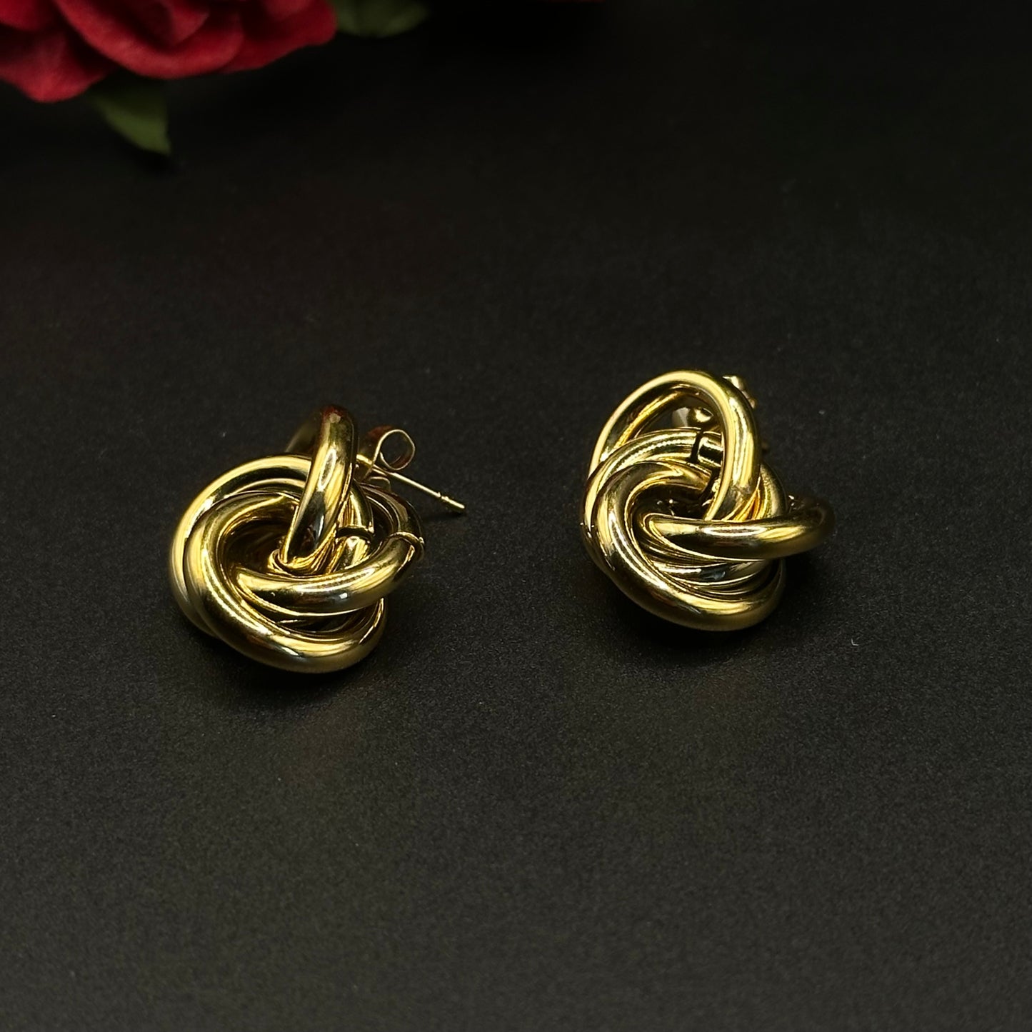 Boucles d’oreilles nœud doré
